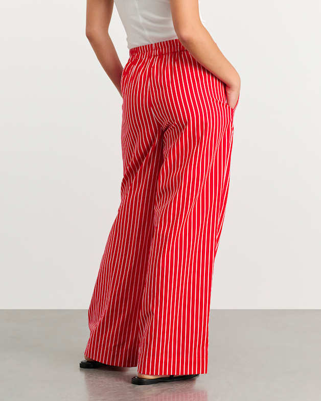 White trousers with red stripe on sale