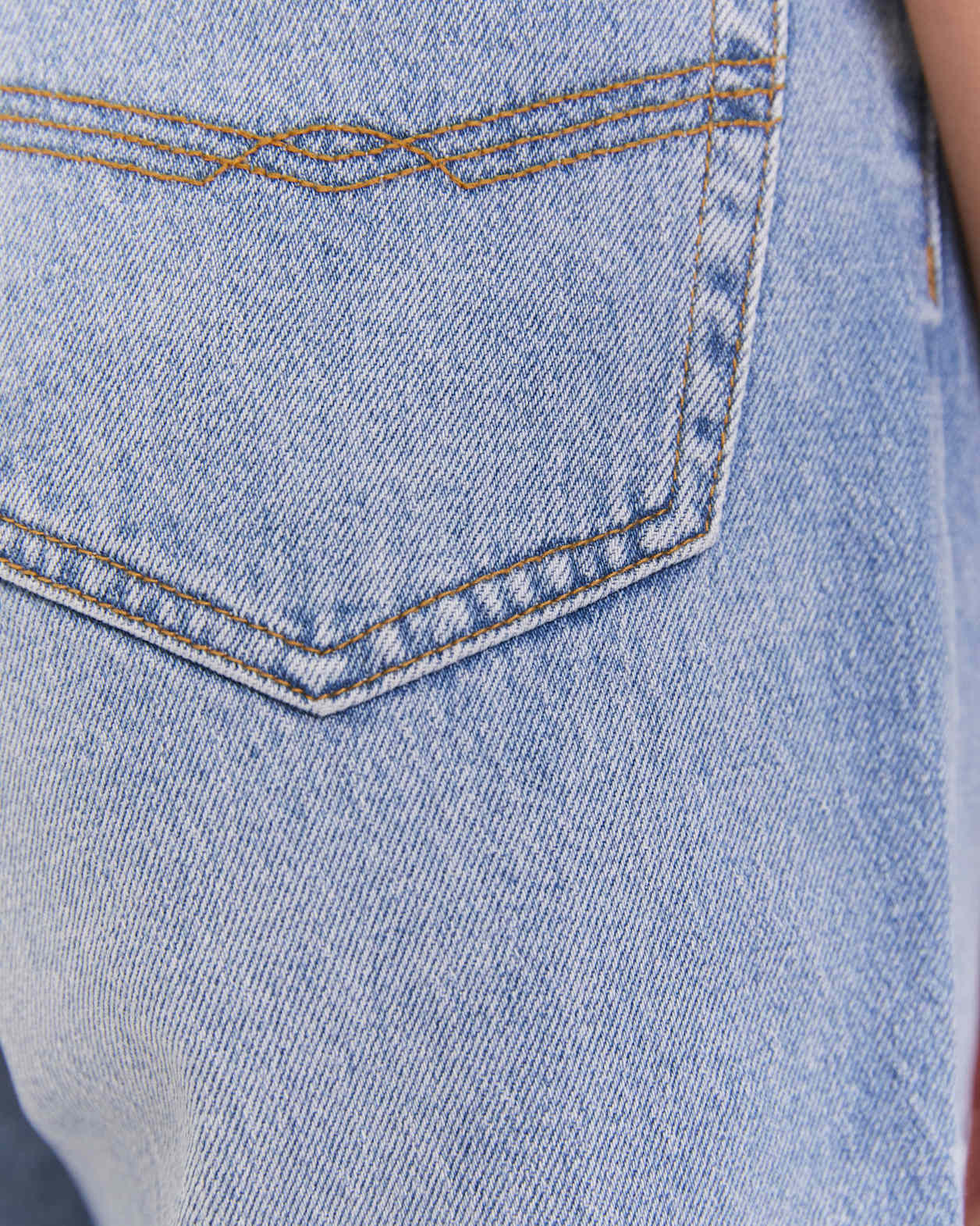 Tyla Denim Longline Short in BANDIT WASH
