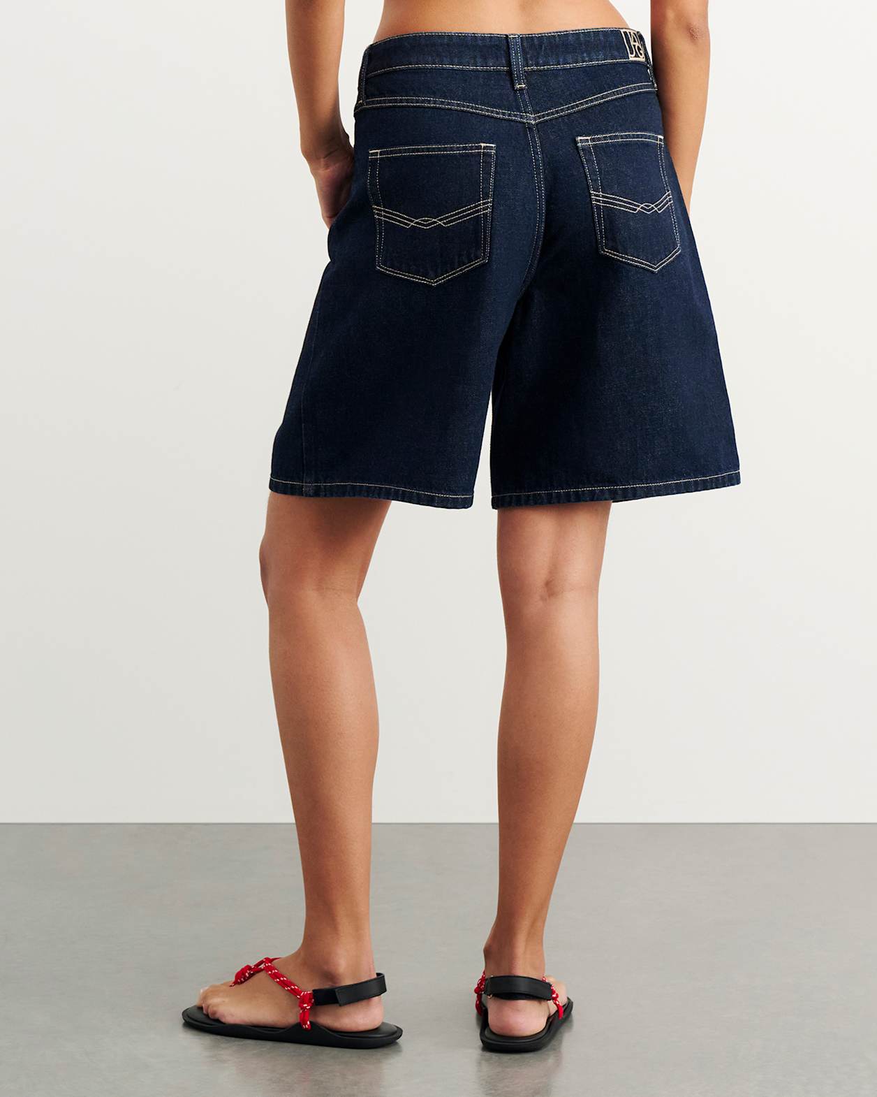 Cora Mid Rise Denim Jort in RAW WASH