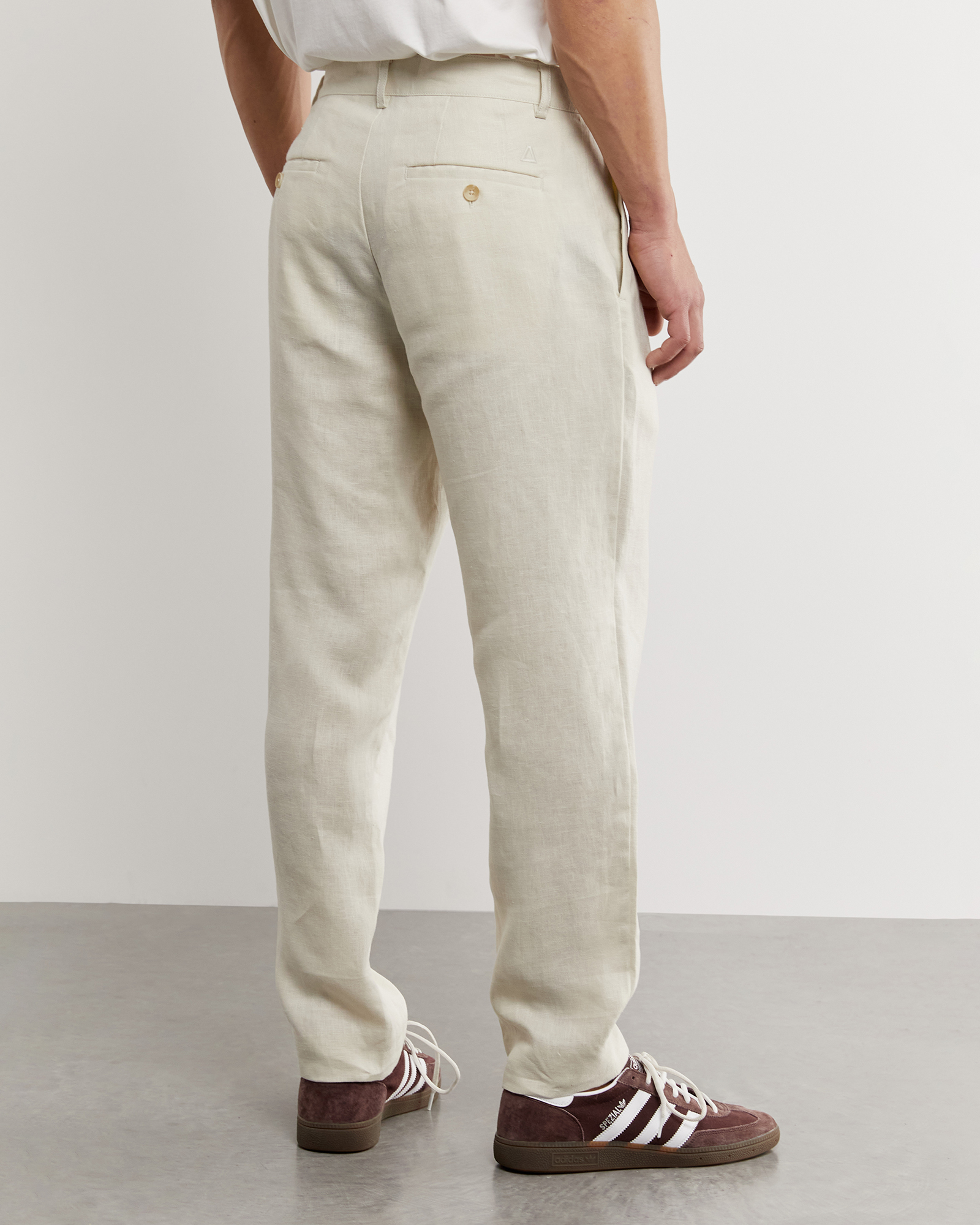 Oatmeal linen trousers on sale